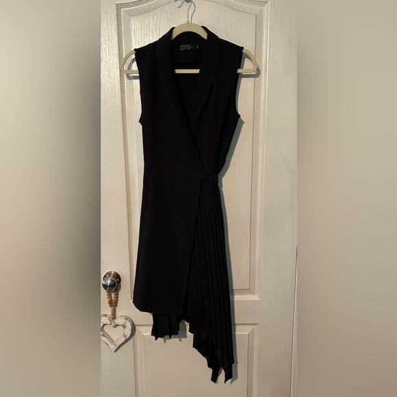 Dresses & Skirts - Black Sleeveless Wrap Dress With Pleated Detailing